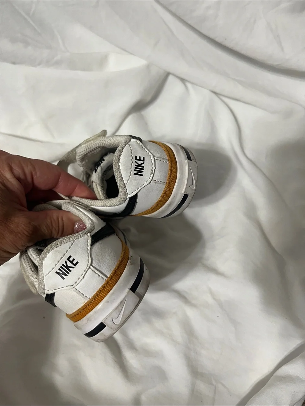 Nike Court Legacy Kids White Sneakers with Black Swoosh and Tan Accent